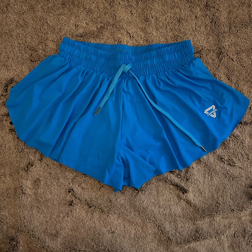 Blue flowy athletic shorts